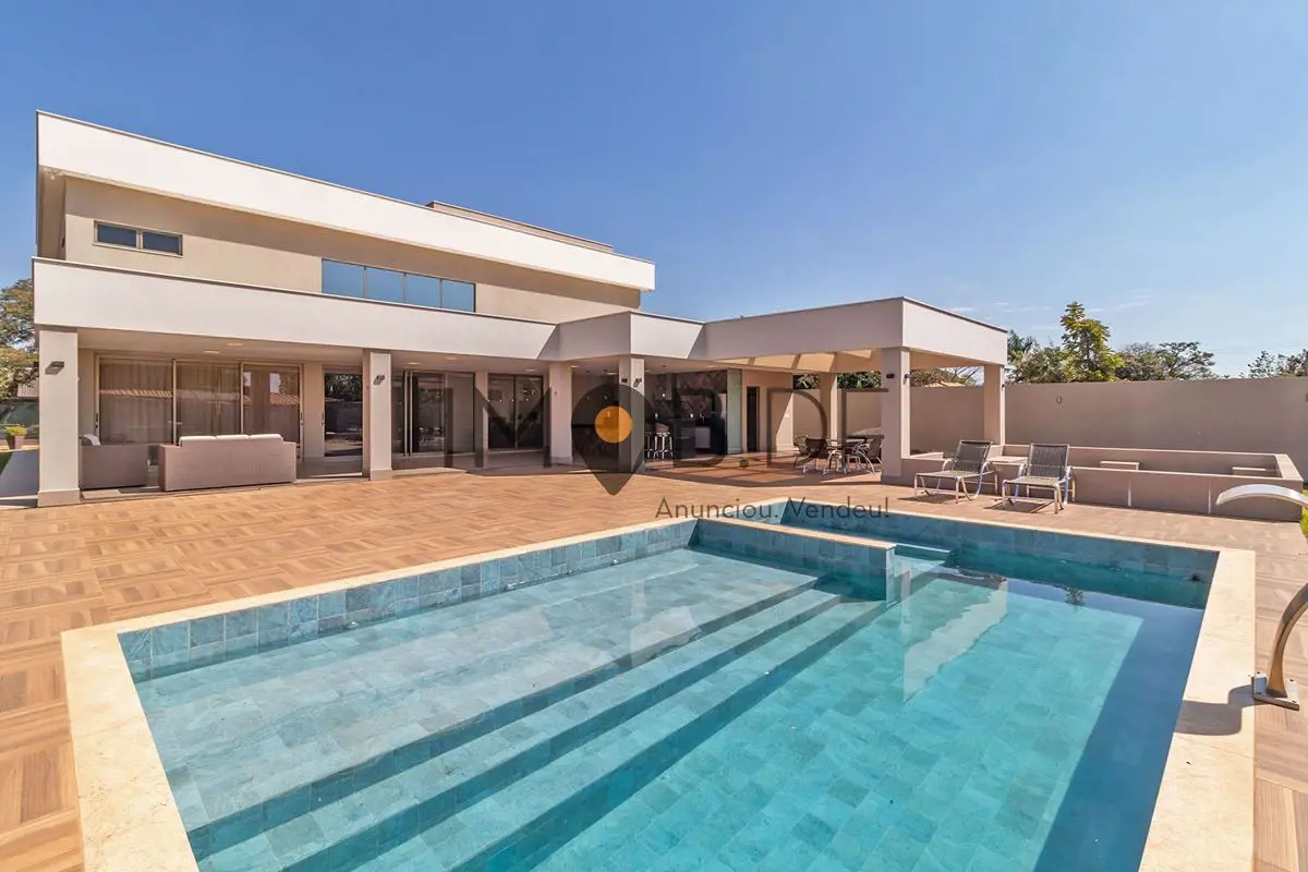 Mansão estilo contemporâneo. 4 suítes, lazer completo, piscina aquecida e fire p...