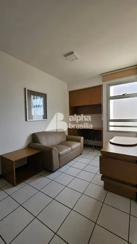 Kitnet Mobiliada 25m²Sala com sofá e rack para computadorQuarto com cama de casa...