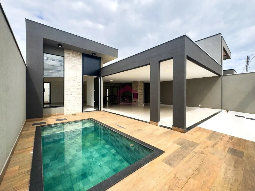 Fernandes & Coelho Imóveis apresenta uma excelente casa moderna no Condomínio Co...