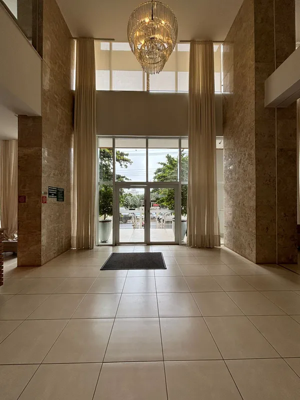 K Apartments - Setor Oeste70 m²1 suíteSala ampla integrada com a cozinha e varan...