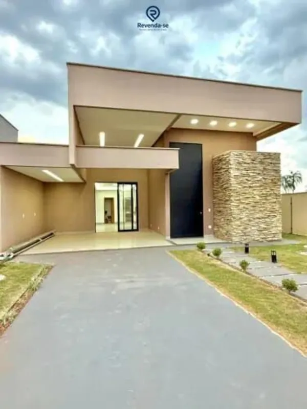 Se você busca tranquilidade e segurança para sua família, esta casa no Terras Al...