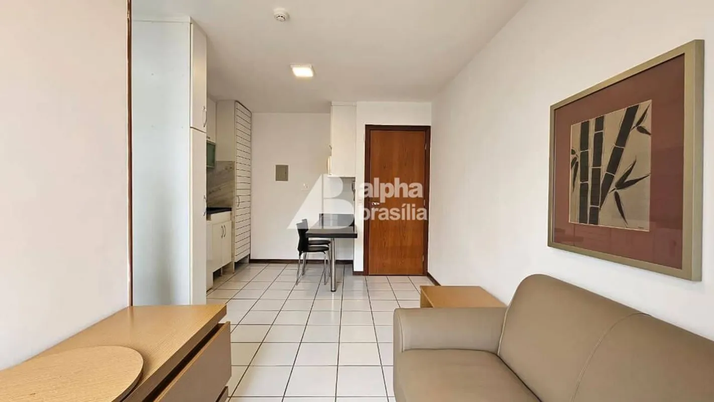 Kitnet Mobiliada 25m²Sala com sofá e rack para computadorQuarto com cama de casa...