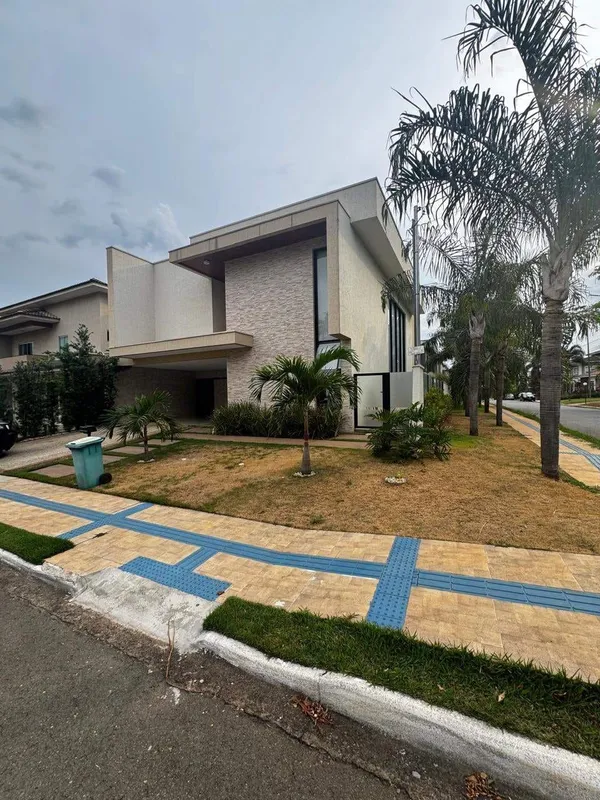 434 m² total 360 m² útil4 suítes5 banheiros Este sobrado no condomínio Jardins M...