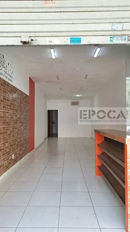 LOJA COM 56M2, VÃO LIVRE, 01 BANHEIRO, 01 PORTA DE AÇO, PISO EM CERAMICA. ALUGUE...