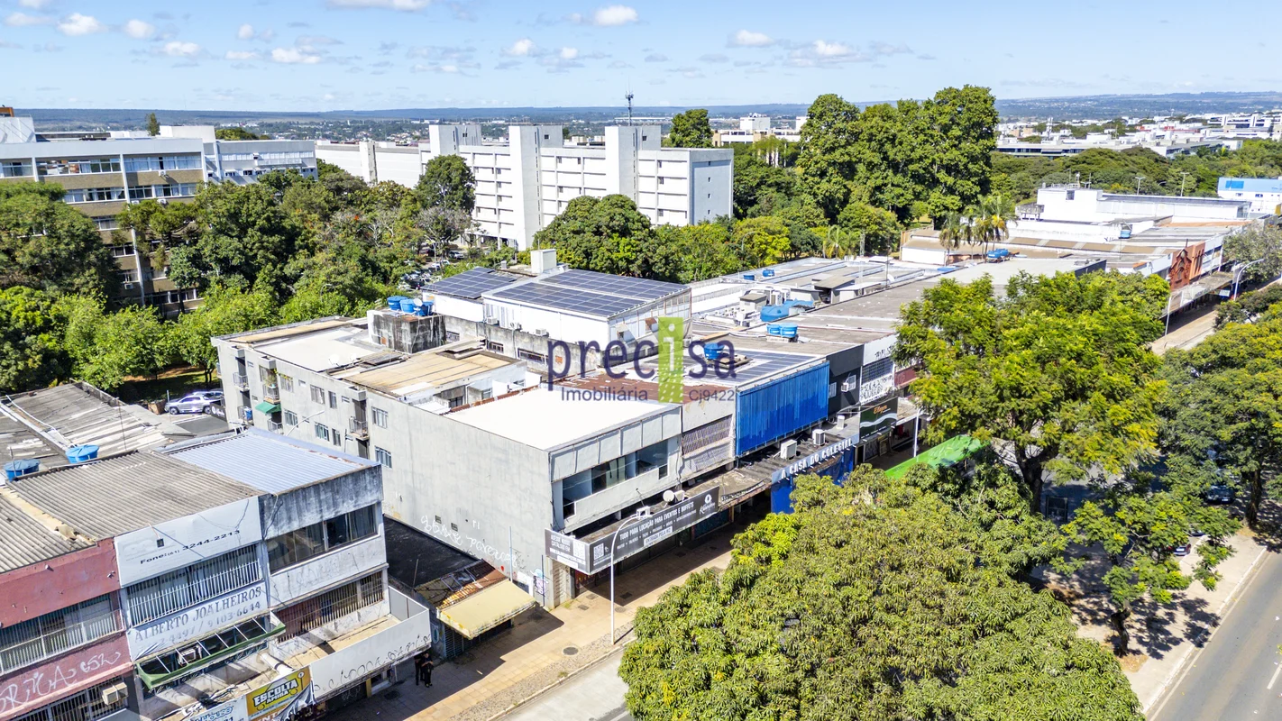 Prédio com 04 pavimentos, sendo subsolo, térreo, 1 e 2º andares, com 10 apartame...
