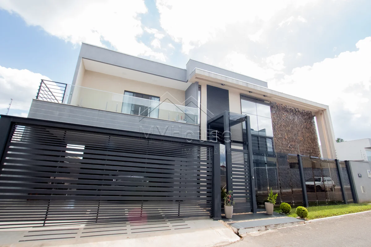 CASA ALTO PADRAO EM ARNIQUEIRA EM CONCOMINIO FECHADO 4 SUITES COM ELEVADOR E MUI...