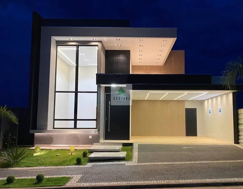 Lote: 360m²;Área Construída: 220 m² + área externa com deck e piscina;3 suítes, ...