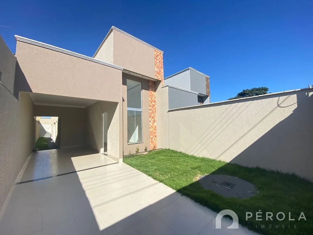 Casa com três quartos sendo uma suíte, sala com pé direito duplo, banheiro socia...