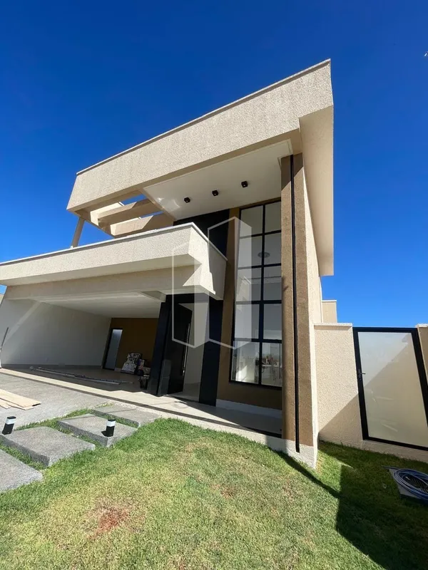 Casa térrea com 3 suítes, sala com pé direito duplo, cozinha com varanda gourmet...